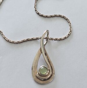 925 sterling silver pendant necklace with a round Green gemstone